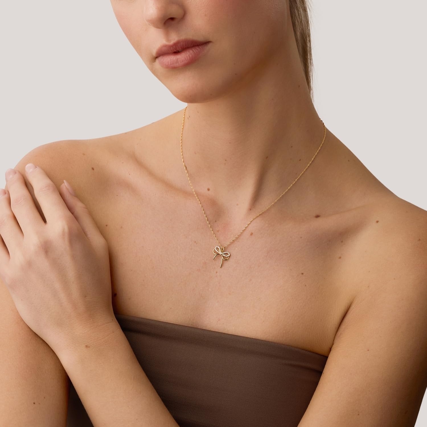 amor-halsschmuck-2100181-kette-schleife-gold-mit-zirkonia image 2